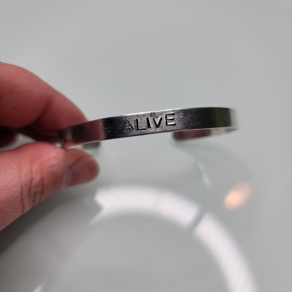 Artisan made Alive silver bracelet with stamped verse inside Christian